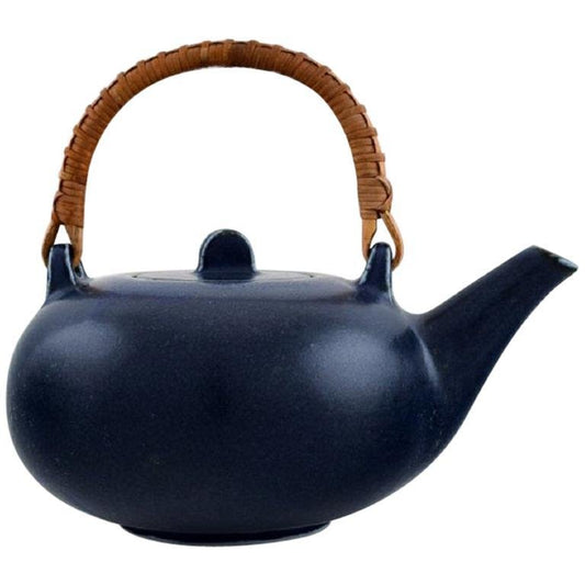 Teapot in Glazed Ceramic with Handle in Wicker by Eva Stæhr-Nielsen for Saxbo