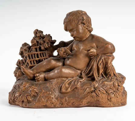 Terracotta Figurine of Child with Bird-WFS-1210976