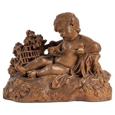 Terracotta Figurine of Child with Bird-WFS-1210976