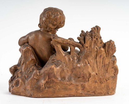 Terracotta Figurine of Child with Bird-WFS-1210976