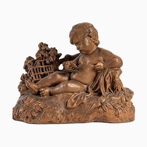 Terracotta Figurine of Child with Bird-WFS-1210976