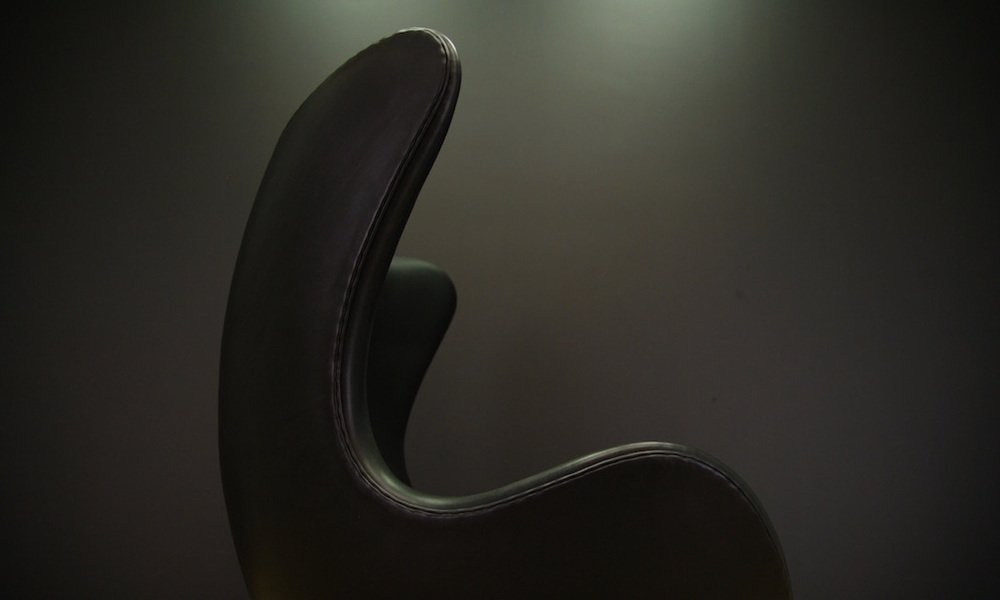 The Egg Chair in Black Leather by Arne Jacobsen for Fritz Hansen