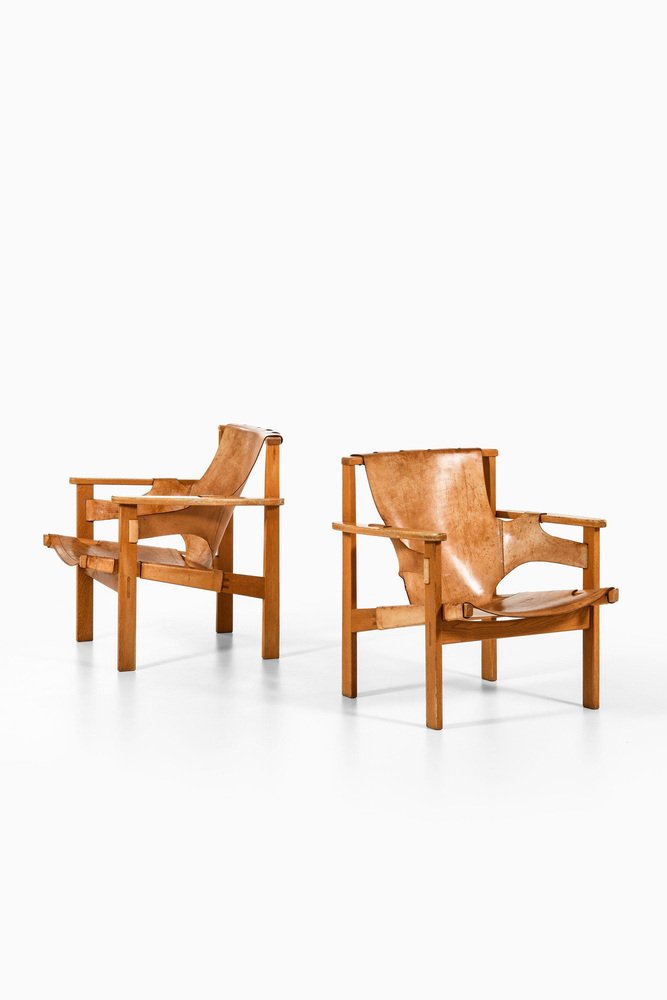 Trienna Easy Chairs in Oak & Original Leather attributed to Carl-Axel Acking, 1957, Set of 2