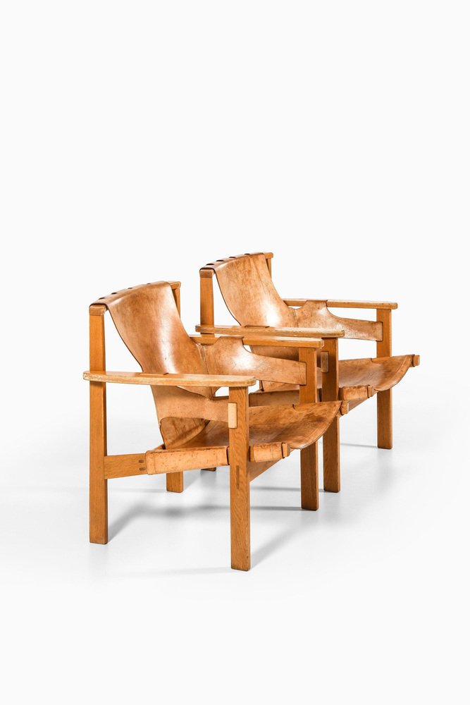 Trienna Easy Chairs in Oak & Original Leather attributed to Carl-Axel Acking, 1957, Set of 2