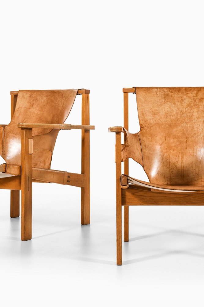 Trienna Easy Chairs in Oak & Original Leather attributed to Carl-Axel Acking, 1957, Set of 2