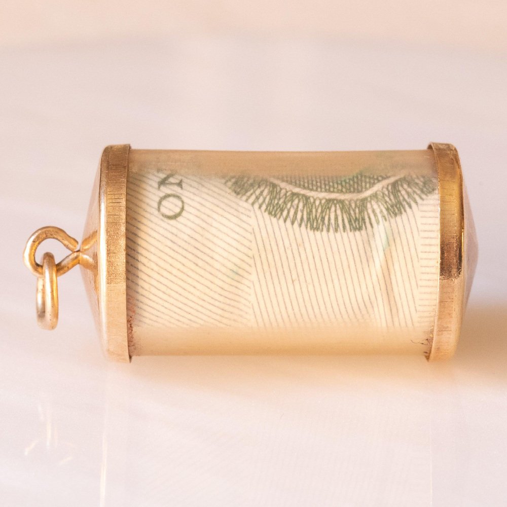 Vintage 9k Yellow Gold Plastic Cylinder Emergency Money Pendant with One Pound Note, 1978