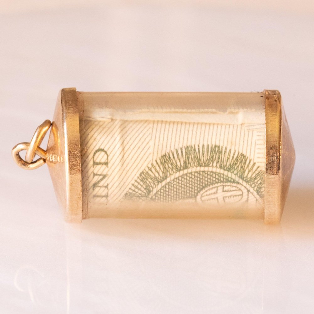 Vintage 9k Yellow Gold Plastic Cylinder Emergency Money Pendant with One Pound Note, 1978