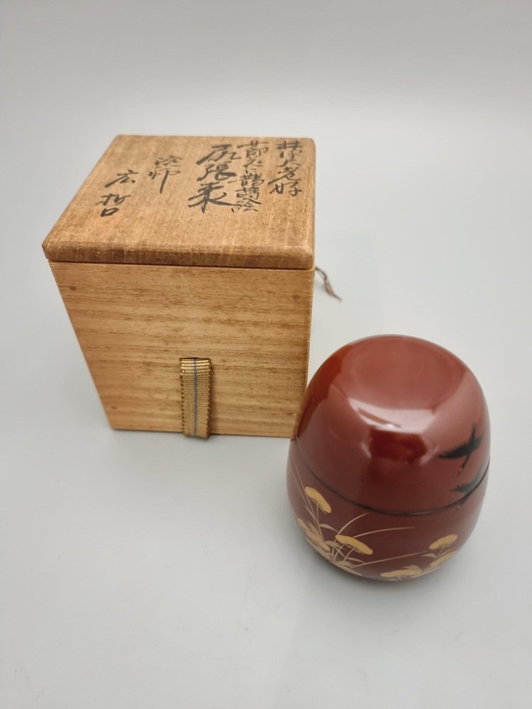 Vintage Japanese Netuske Matcha Container with Maki-E Lacquer in Maroon Colour with Black Cranes Over Golden Field, 1960s