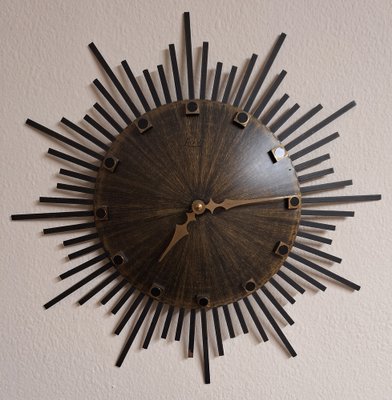 Vintage Wall Clock Sunburst with Brown Dial and Black Metal Rays from Luxus, 1970s-HOI-2043212