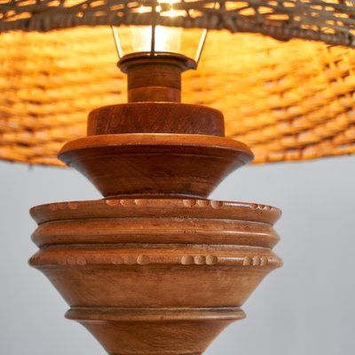 Wabi-Sabi Table Lamp in Turned and Carved Wood with Rattan Shade, 1920s-LPQ-1799946