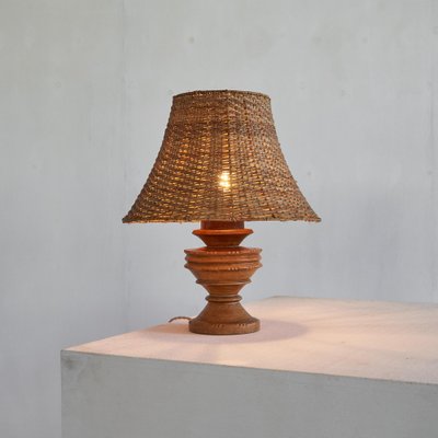 Wabi-Sabi Table Lamp in Turned and Carved Wood with Rattan Shade, 1920s-LPQ-1799946