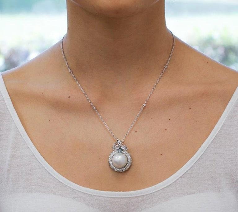 White and Fancy Diamonds, South-Sea Pearl, 18 Karat White Gold Pendant Necklace