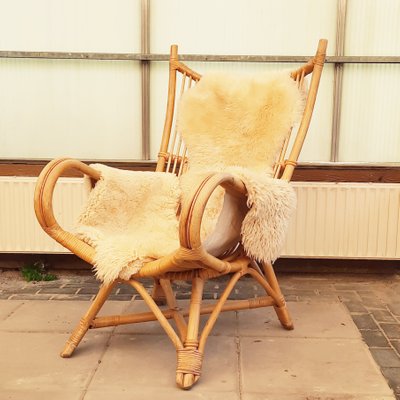 Wingback Lounge Chair in Rattan, 1980s-SJU-1391239