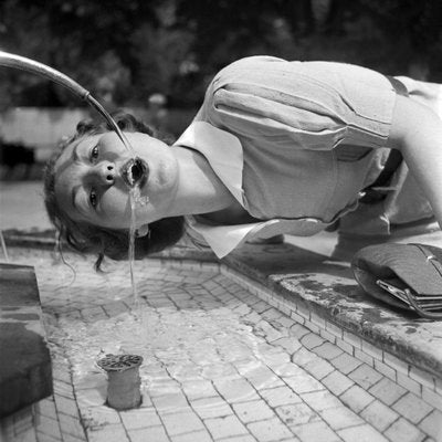 Woman Drinking From Well at Bad Cannstatt, Stuttgart Germany, 1935-DYV-988145