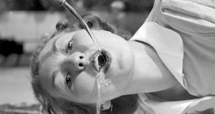 Woman Drinking From Well at Bad Cannstatt, Stuttgart Germany, 1935-DYV-988145