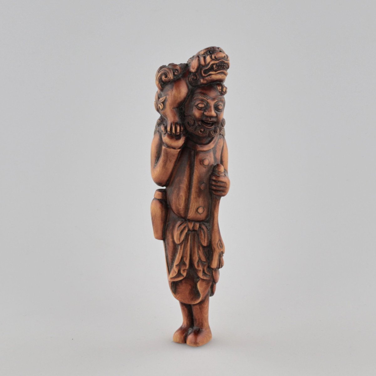 Wooden Netsuke Traveler