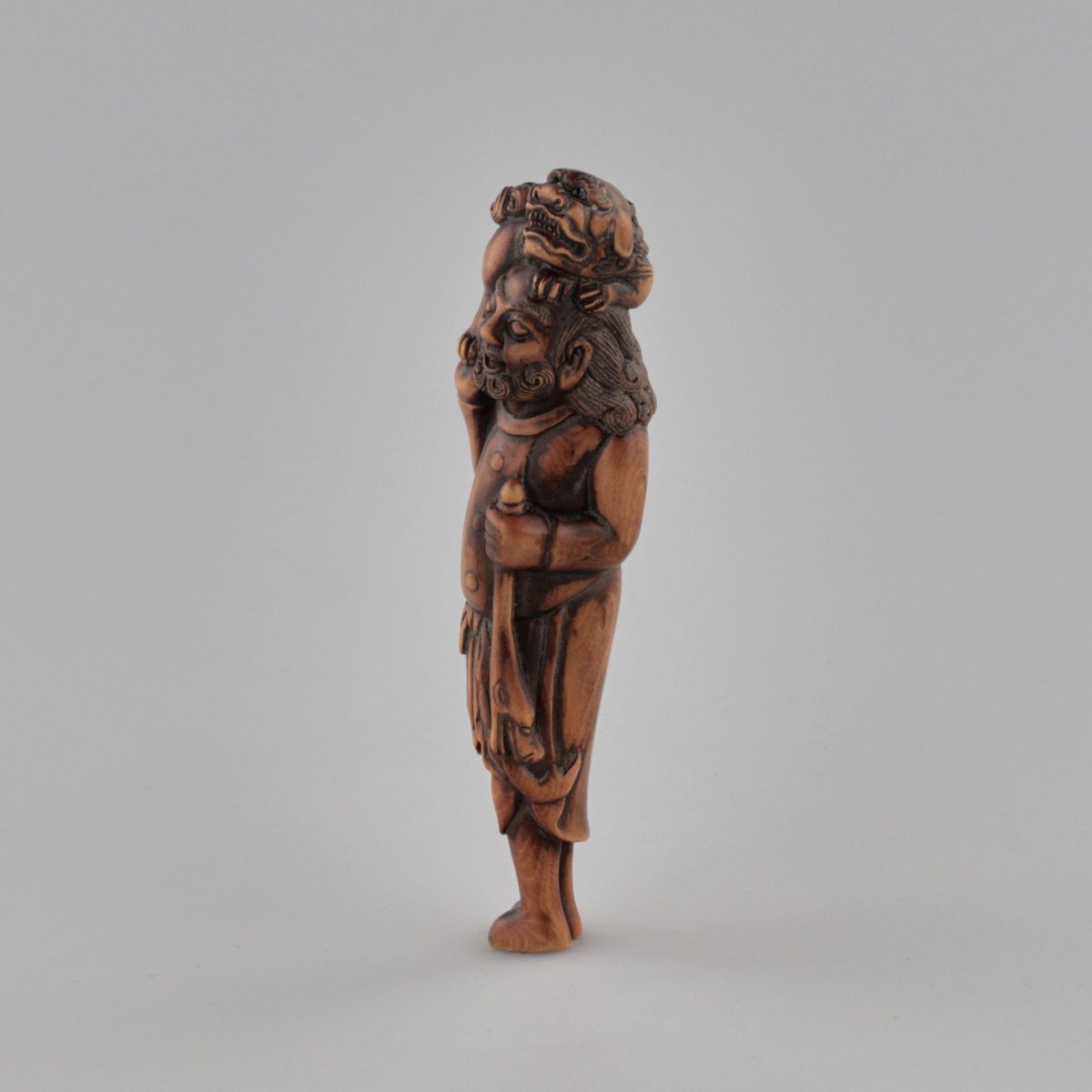 Wooden Netsuke Traveler