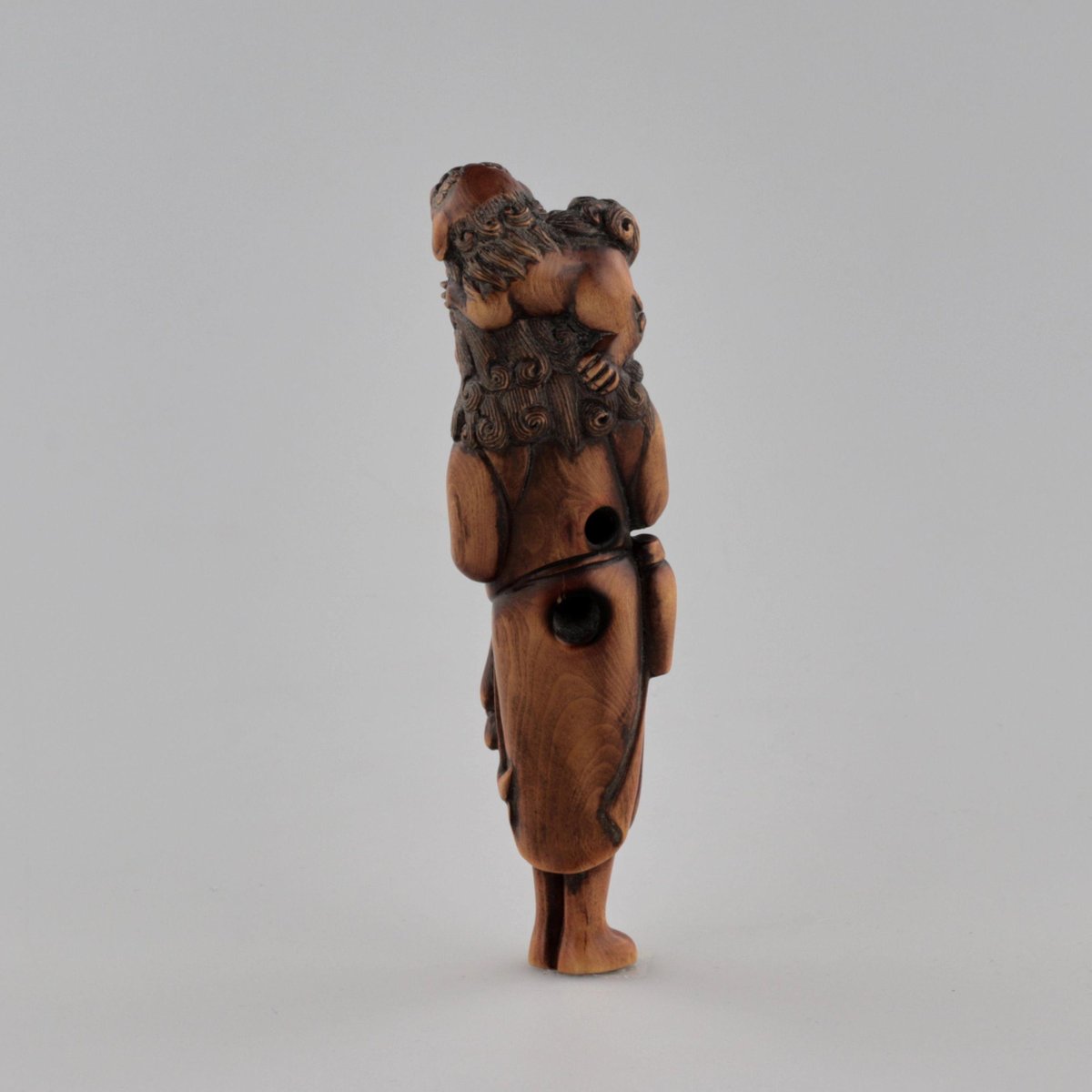 Wooden Netsuke Traveler