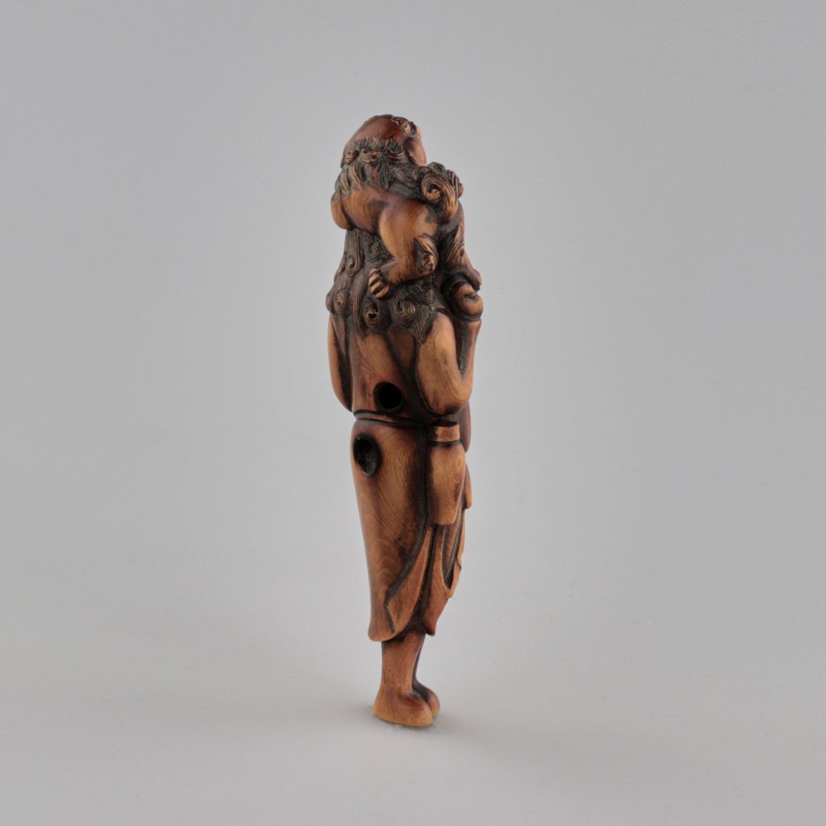 Wooden Netsuke Traveler