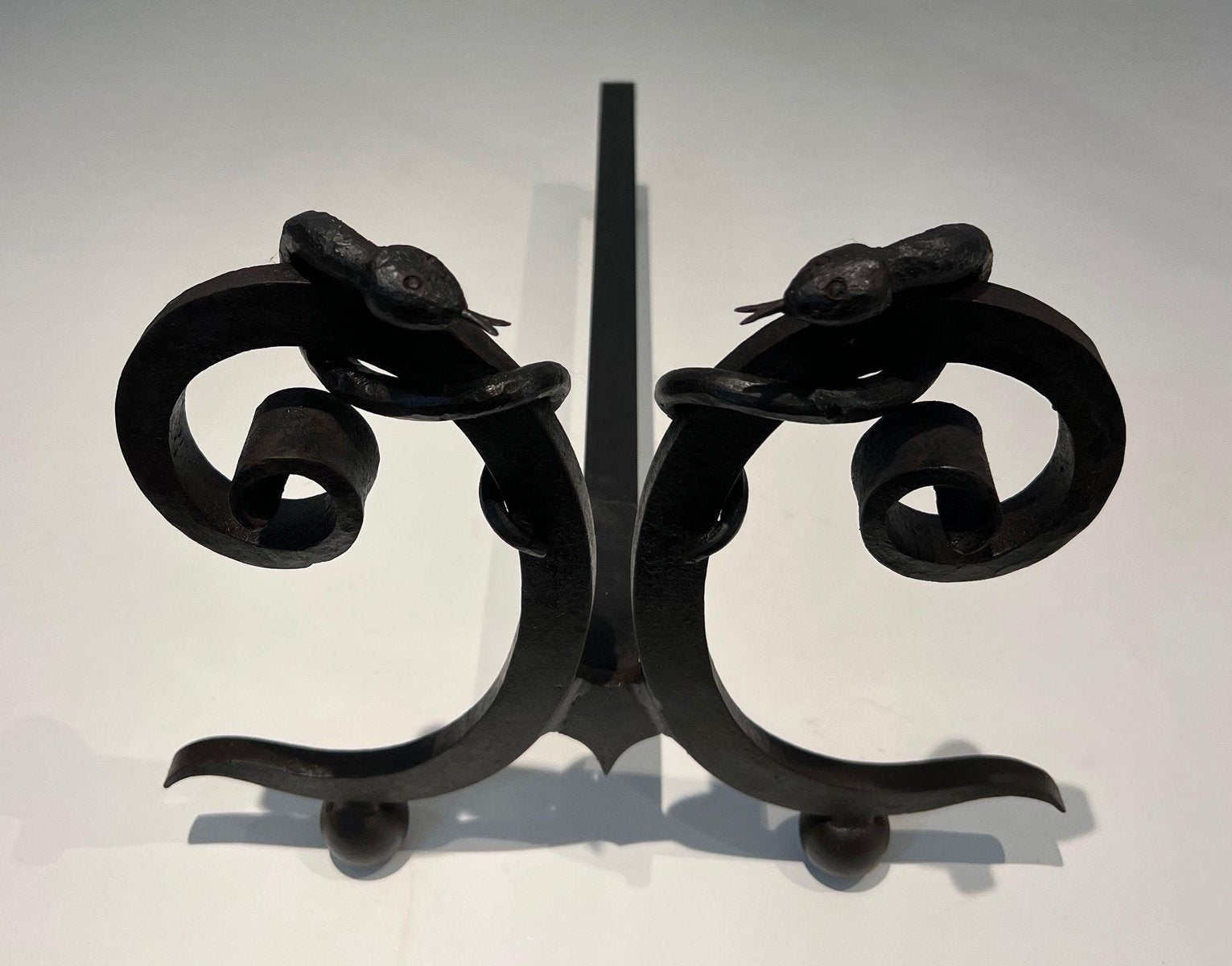 Wrought Iron Chenets with Snakes in the style of Edgar Brandt, 1950s, Set of 2