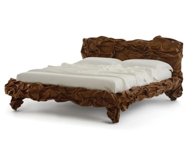 GRINZA - Leather double bed with upholstered headboard by edra