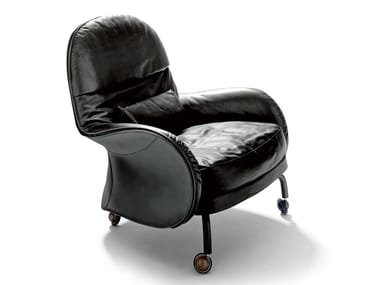 LOUISIANA - Upholstered tanned leather armchair with castors by DE PADOVA