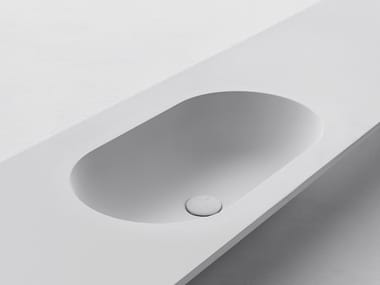 OVAL - Cristalplant® washbasin with integrated countertop by Falper