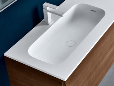 ROUND - Cristalplant® washbasin with integrated countertop by Falper