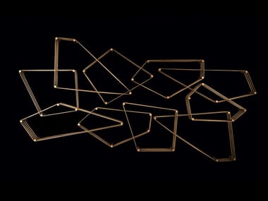 TANGRAM - Wall-mounted sectional brass bookcase by Henge