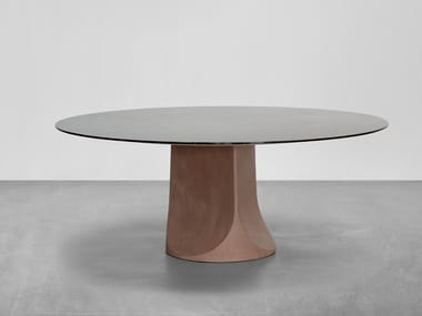 TOGRUL - Round marble table by Tacchini