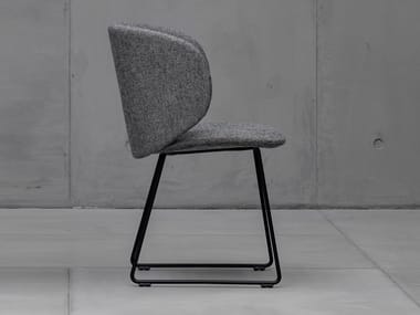 DUA - Sled base upholstered fabric chair by Kristalia