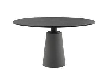 MESA - Round natural stone table by Poltrona Frau